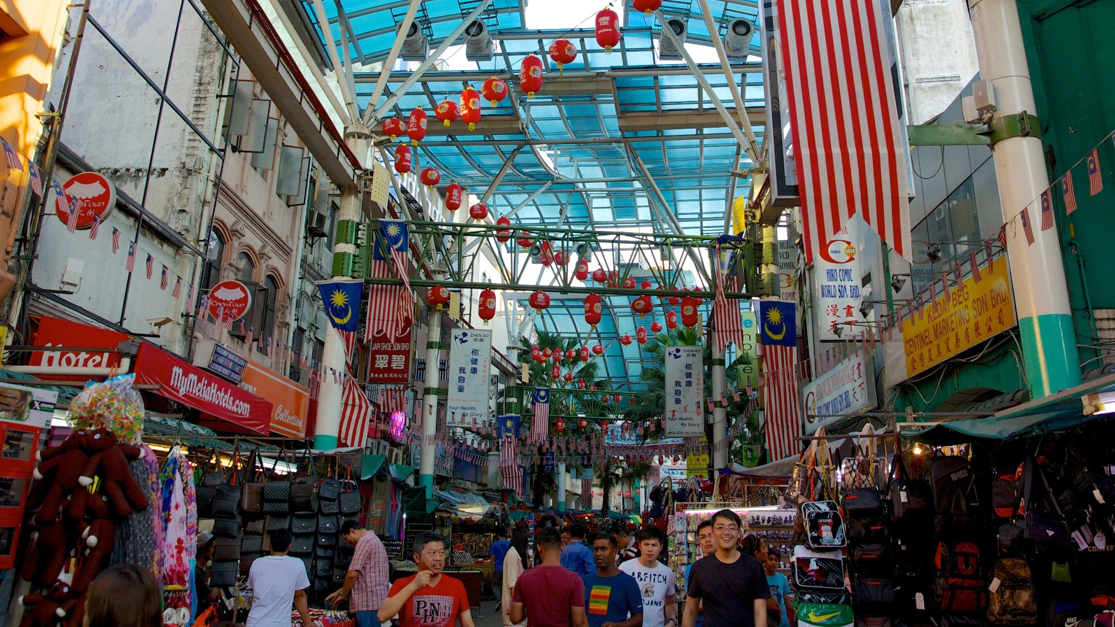 Petaling Street which includes a city, markets and street scenes