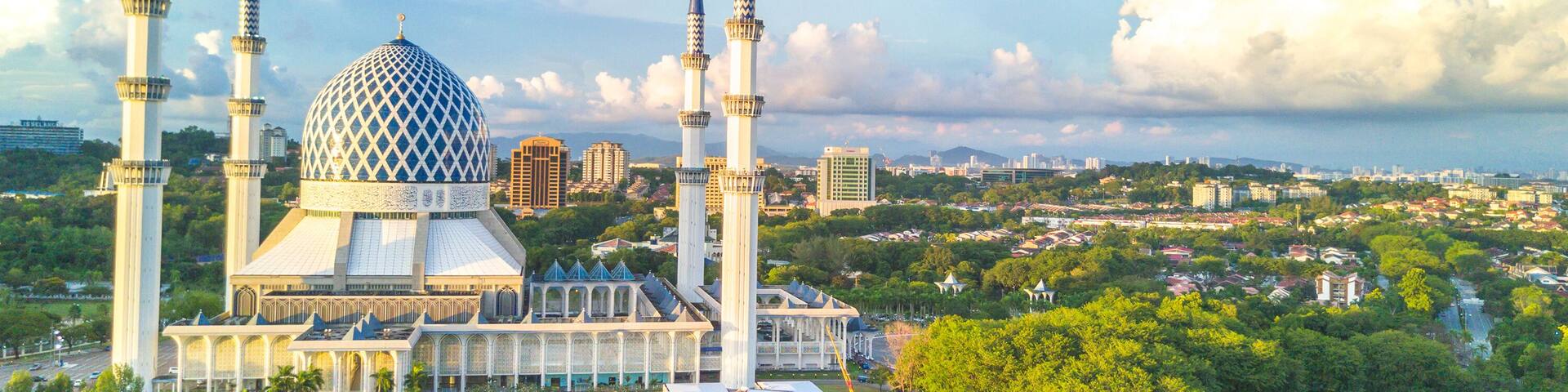 Aerial view of Masjid Sultan Salahuddin Abd Aziz Shah during sunset.