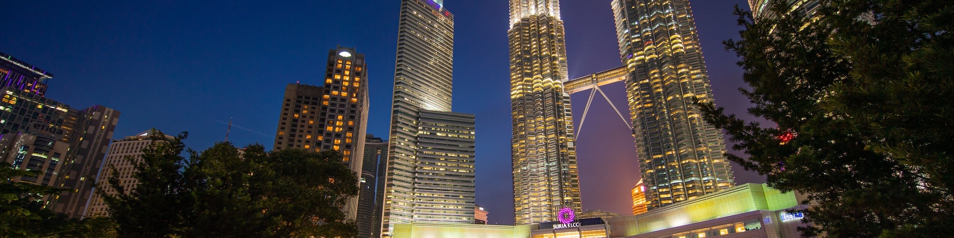 KLCC Park featuring a high rise building, a city and night scenes