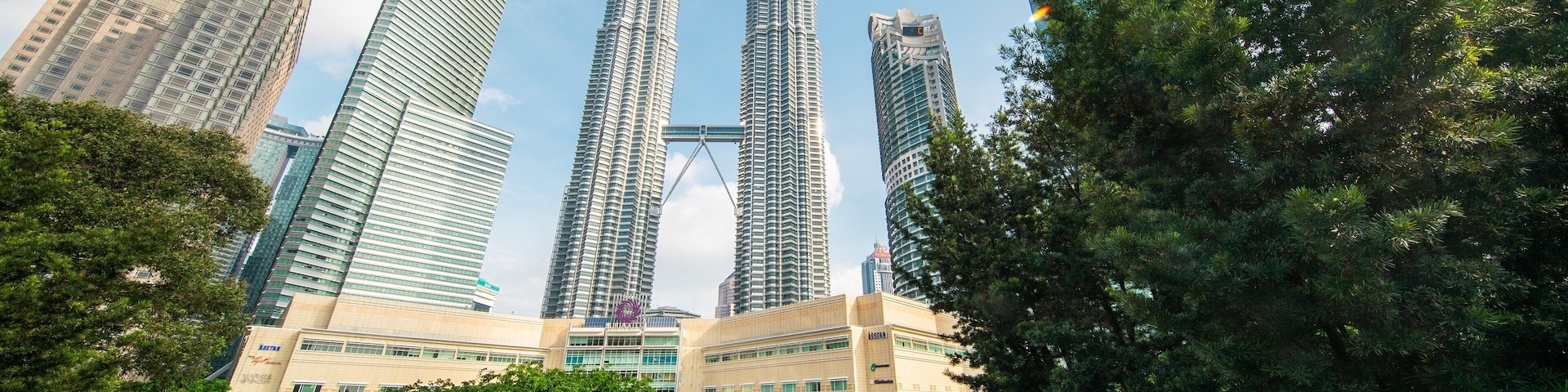 KLCC Park which includes a city and a high rise building