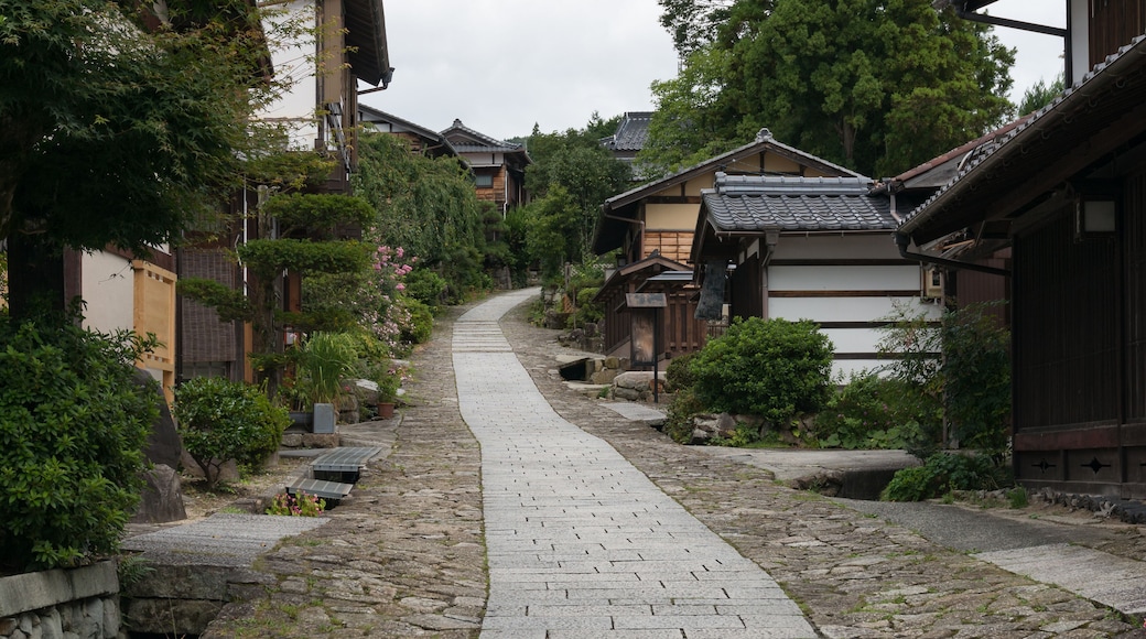 Stone lined street with traditional Japanese buildings. Magome, Japan
