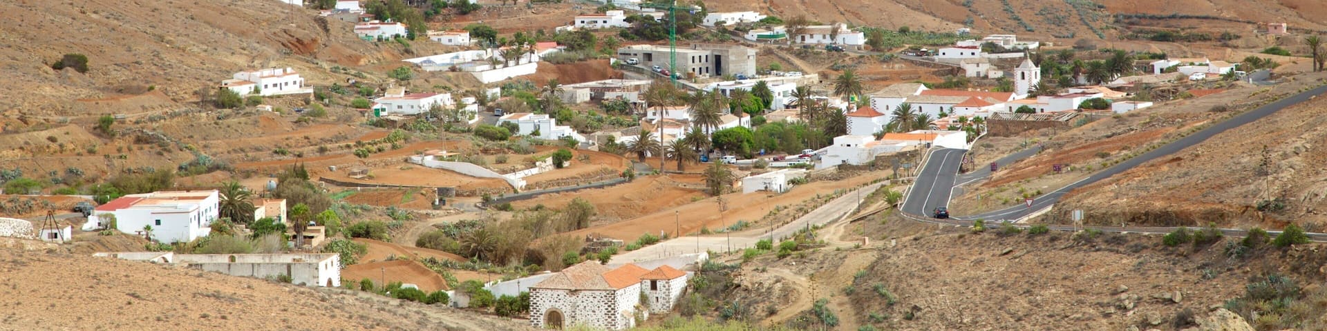 Betancuria featuring desert views and a small town or village
