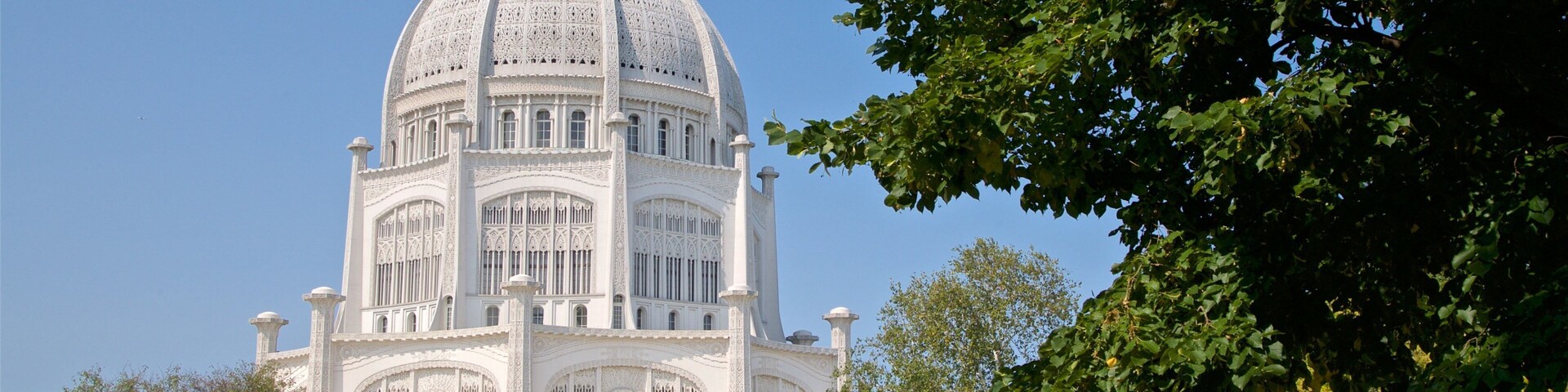 Baha\'i House of Worship showing heritage architecture and a garden