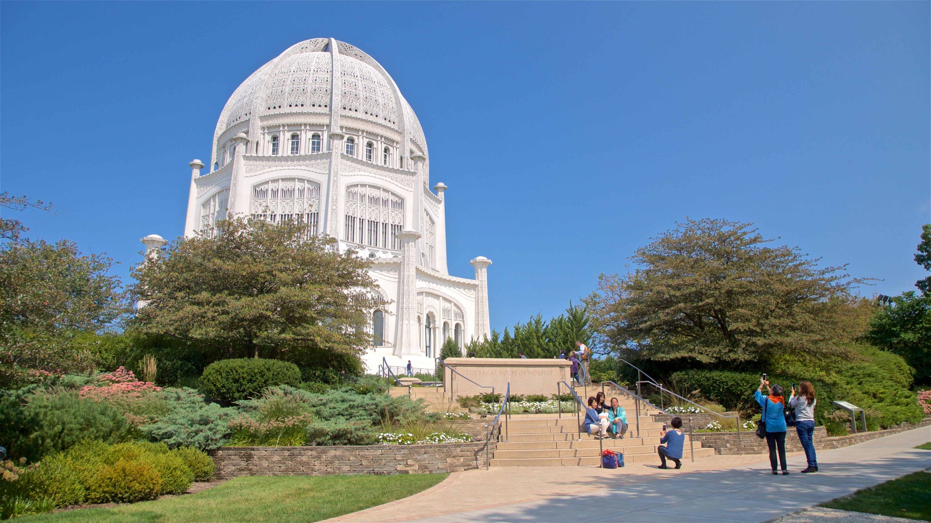 Baha\'i House of Worship showing heritage architecture as well as a small group of people