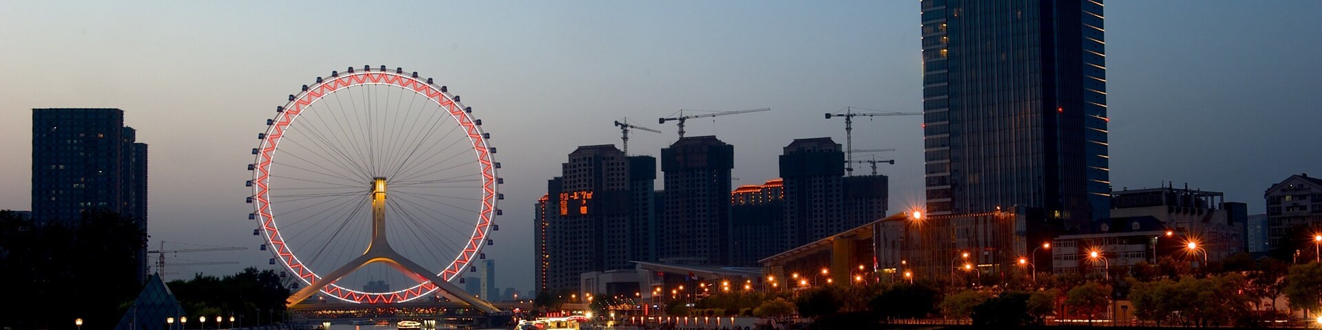 Tianjin Eye showing central business district, a city and night scenes