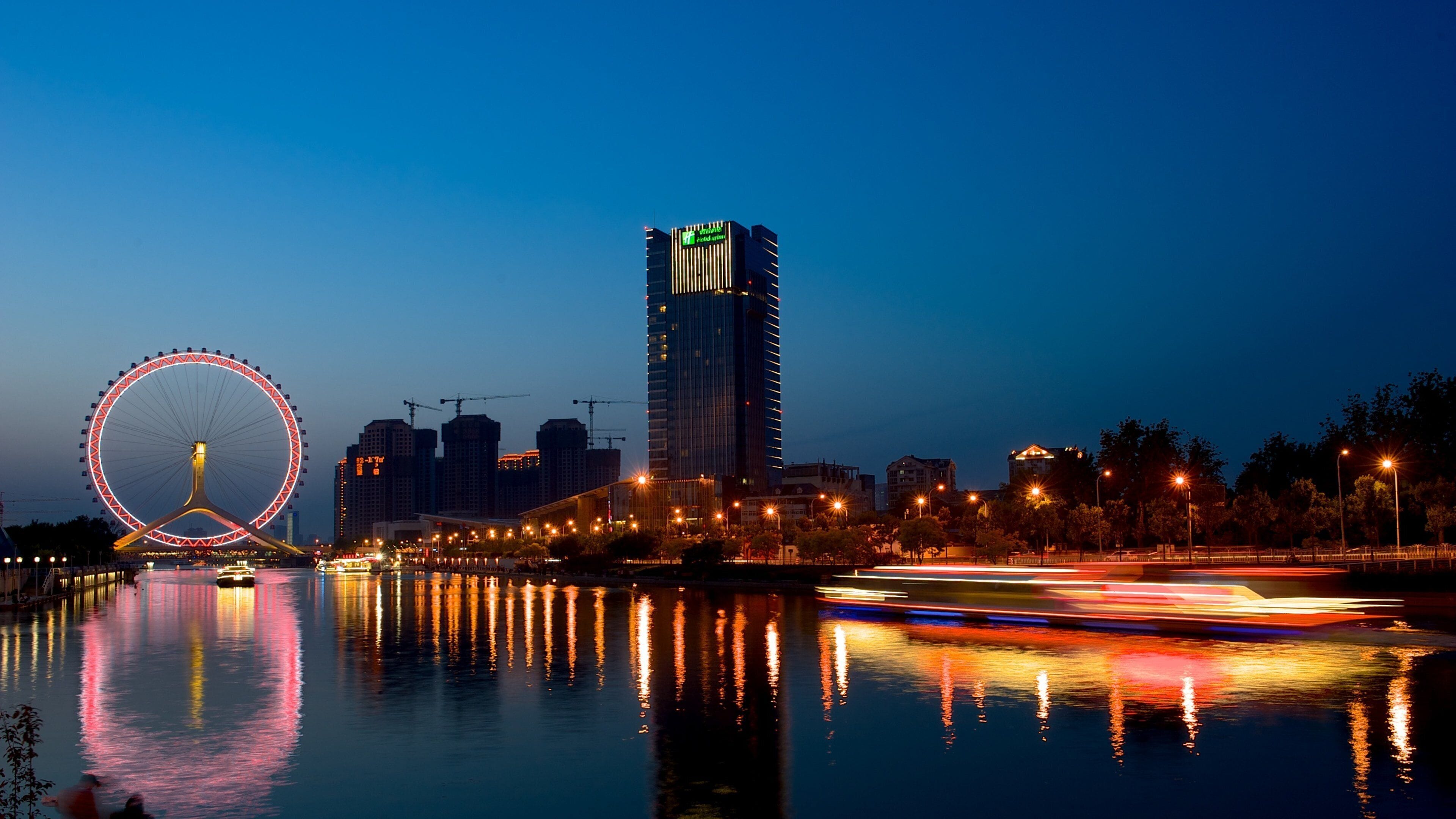 Ojo de Tianjin ofreciendo distrito financiero central, una ciudad y un río o arroyo