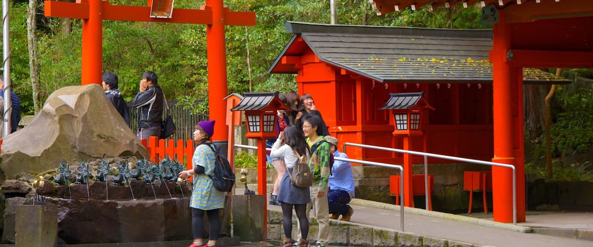 Hakone Shrine which includes a temple or place of worship as well as a small group of people
