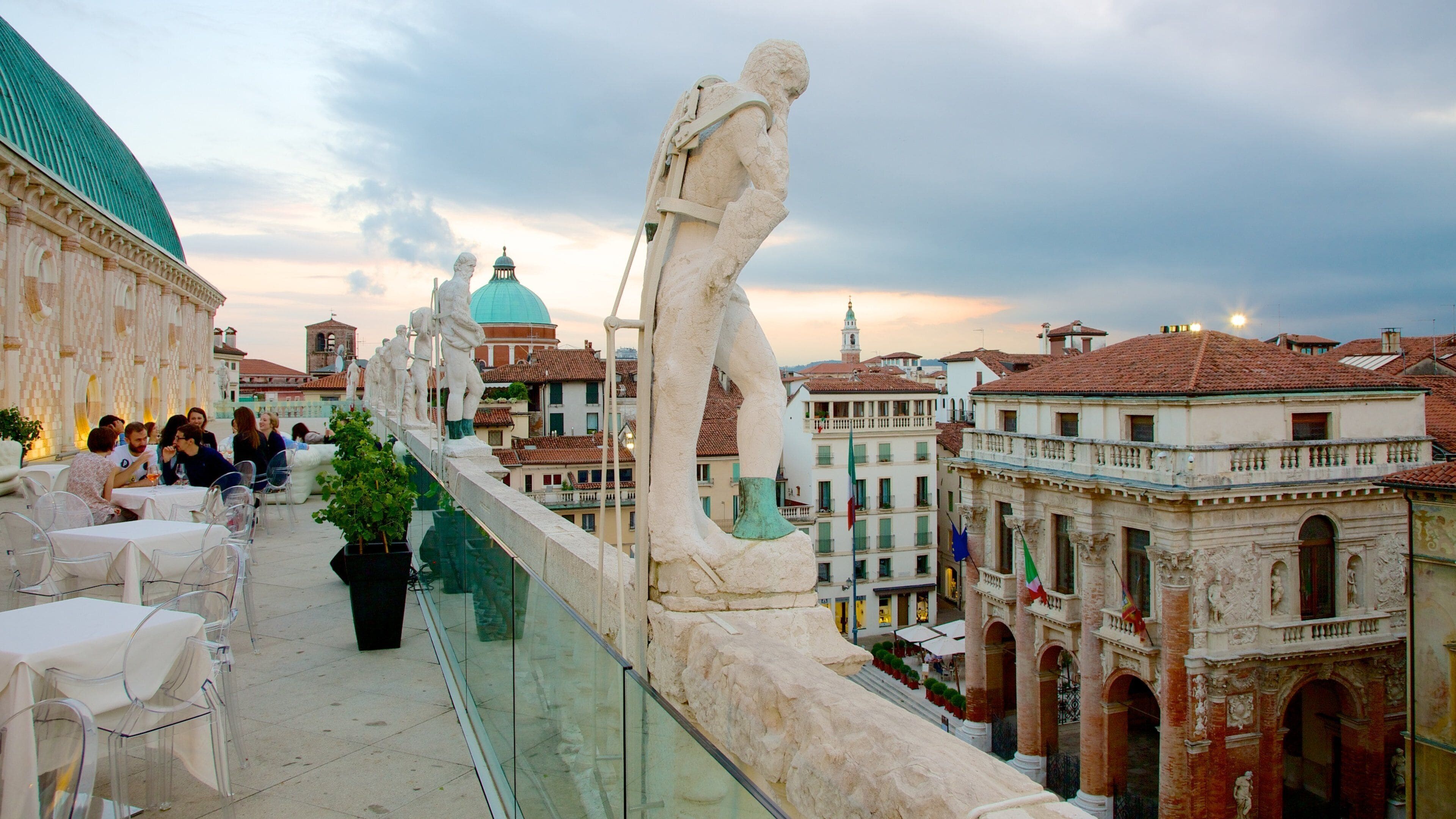 Piazza dei Signori showing a city, dining out and a statue or sculpture