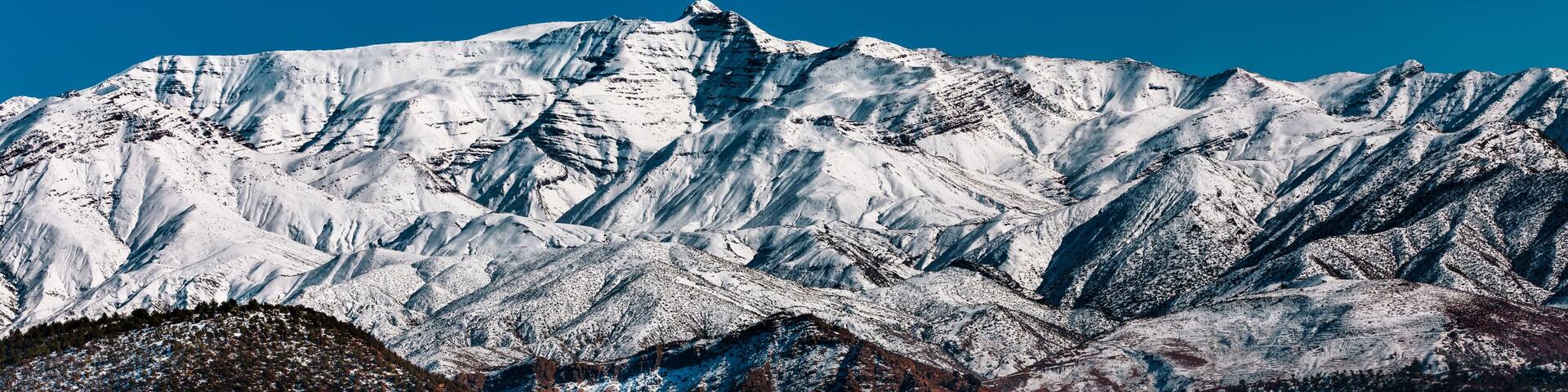 Morocco, Marrakesh-Safi, Al Haouz. Panorama of High Atlas mountains covered with snow.