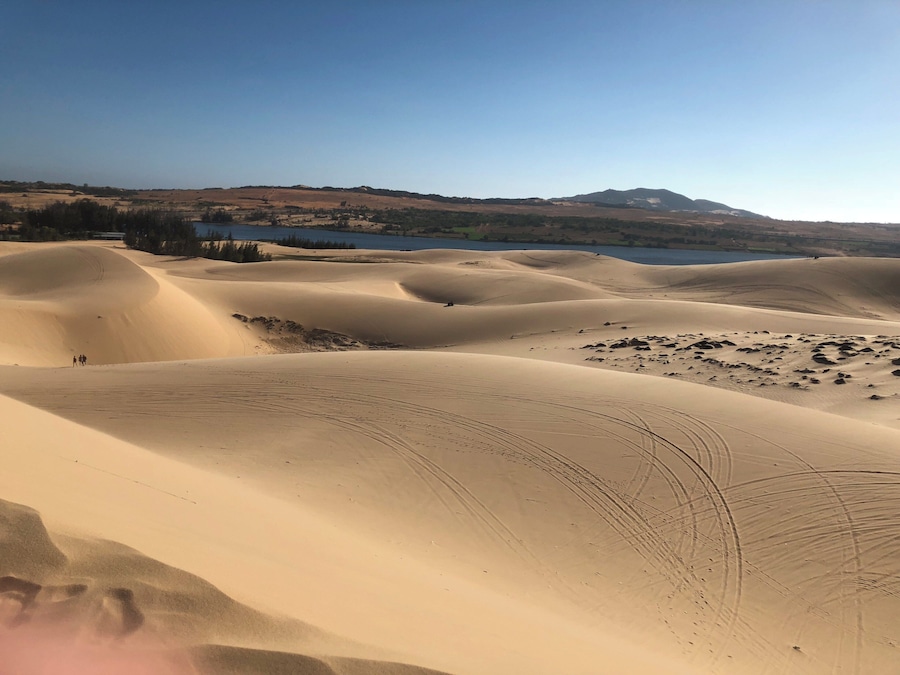 “No matter how long I wait, how long I travelled but I will never stop to look for the oasis in the desert of life and quench my soul to be alive. “
White Sand Dunes
Discover The White Sand Dunes of Vietnam in Hòa Thắng, Vietnam: A desert in southeast Asia, complete with a beautiful lake covered in lotus flowers.
#vietnam #photography #nature #travel #adventure #wonderer #muine #vacation