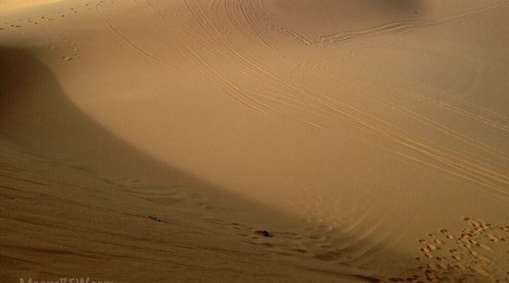 This was the beautiful views of the white sand dunes about 40km from Mui Ne. We did an afternoon trip with Muine Backpackers travel and tour agent. We all went in a Russian Jeep to the Fairy Stream, views overlooking some fishing boats (unfortunately a very polluted beach), then onto the white sand dunes as seen here. After about an hour of running up/down the dunes we went for a sunset at the red sand dunes. All of this for $7 per person. We wanted to rent a scooter but after seeing the roads/roadwork on the way to the white sand dunes we were happy we didn't. Terrain for a jeep or off-road bike. The only downfall was they overbooked the tour and it was a tight squeeze in the back of the Jeep. Overall it was a good trip which combined everything you need to see in Mui Ne or surrounding area. Our recommendation would be to see the White sand dunes and then a sunset at the red sand dunes. Sliding down the dunes on plastic boards the local kids try and sell you for about 25000-40000 dong don't work and ours broke. There are no sand boards to rent unfortunately. #roadtrip