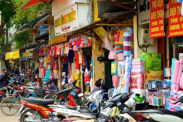 Dong Xuan Market som viser markeder, gadeliv og en by