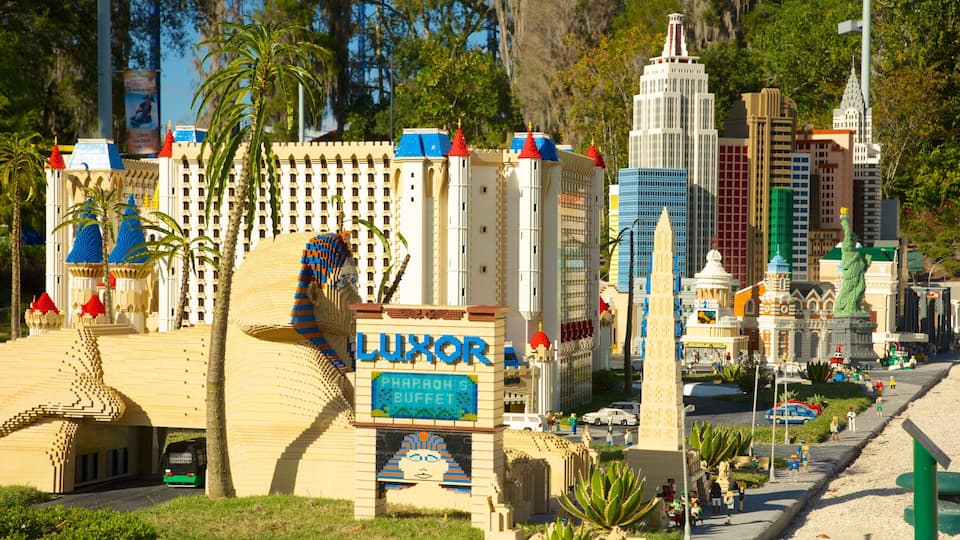 A detailed LEGO model of a cityscape with prominent buildings like Luxor and a pyramid structure.