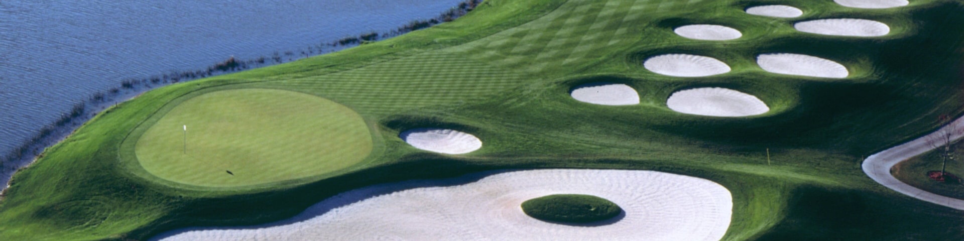Falcon\'s Fire Golf Club which includes a lake or waterhole and golf