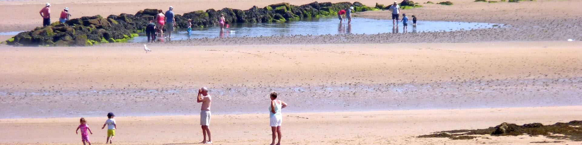 Fish trap built near the low-tide mark of Lligwy Bay, near Moelfre, Anglesey. Post-medieval in date, it is covered at high-tide, and would have trapped fish in the pond it creates at low-tide.