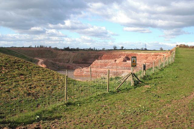 Quarry at Ibstock This is a clay pit owned by Ibstock Brick, an international company which has its origins in the village of Ibstock. See this http://www.ibstock.com/ibstock-history.asp for the history of the company and this http://www.ibstock.com/pdfs/environmental-report/the-leicester-project.pdf for interesting information about the environmental work undertaken by the company around the village of Ibstock .