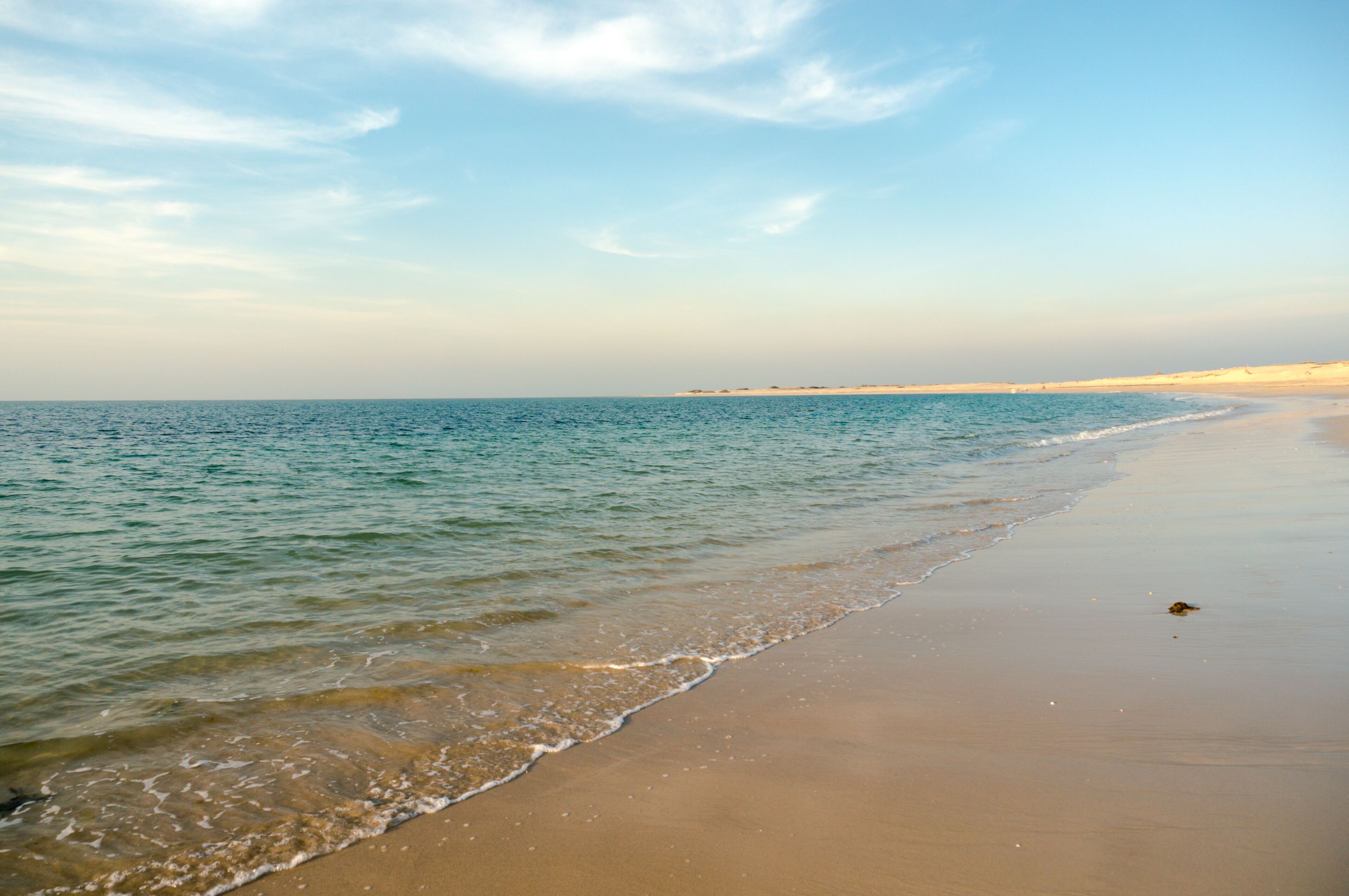 Shivrajpur beach near dwarka gujarat india at dusk with bue arabian sea