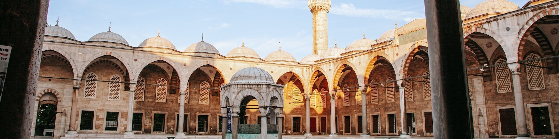 Eyup Sultan Mosque showing heritage architecture and a square or plaza as well as a couple