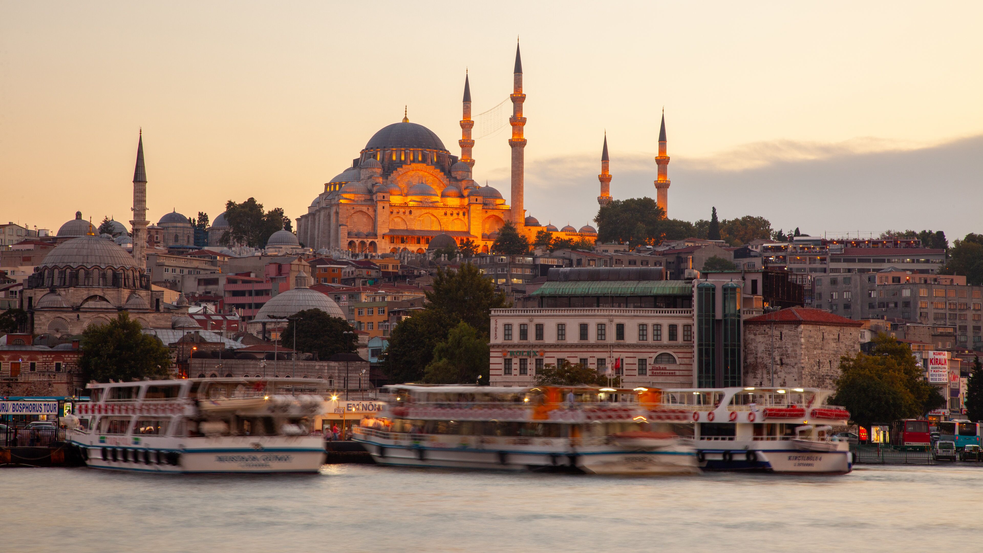 Rustem Pasha Mosque showing heritage architecture, landscape views and a sunset