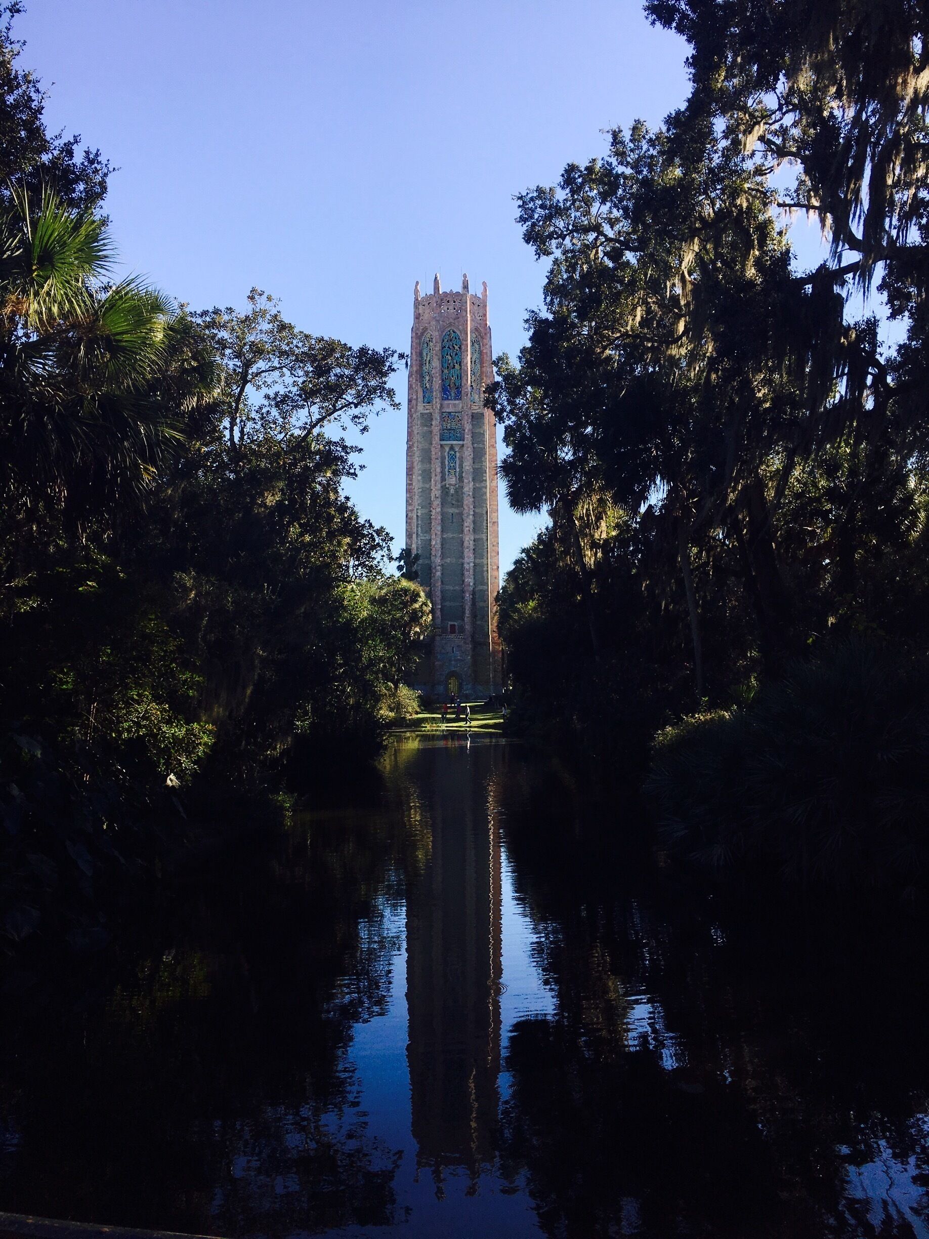 The Bok Tower and its reflection - the singing Tower houses a 60-bell carillon - the carillon is played twice a day at 1pm and 3pm - idyllic setting to relax #florida #stunningstructures