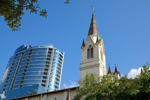 Cathedral Church of St. Luke featuring a high rise building, a church or cathedral and heritage architecture