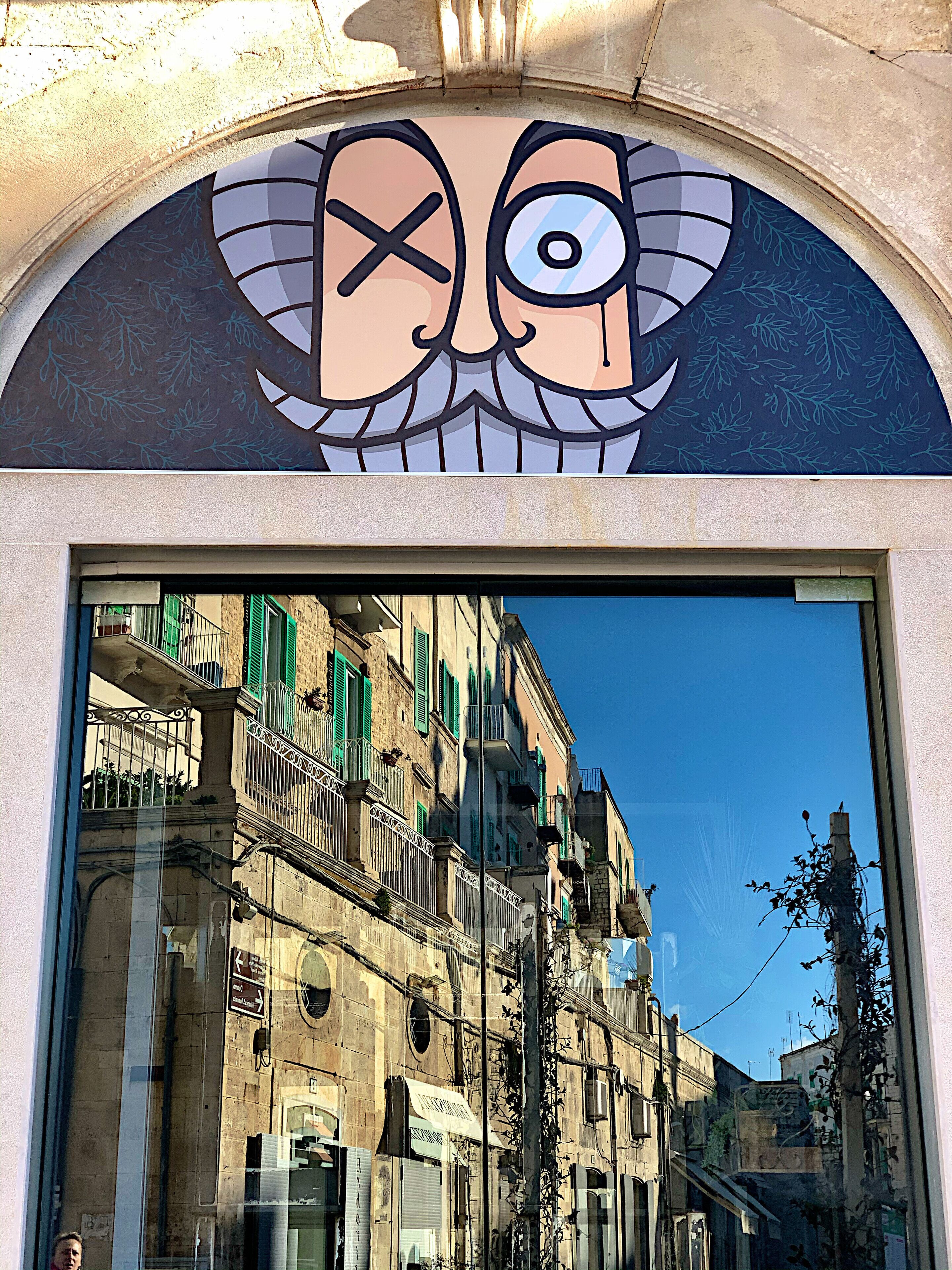 Molfetta street in reflection