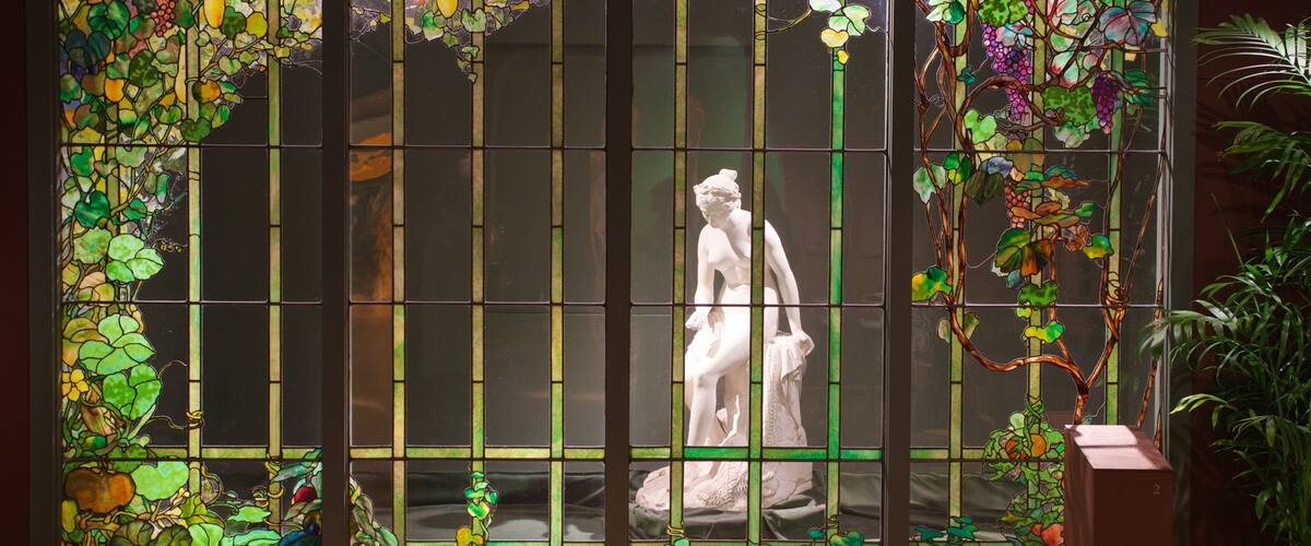 Morse Museum of American Art showing a statue or sculpture and interior views