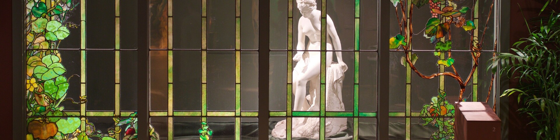 Morse Museum of American Art showing a statue or sculpture and interior views