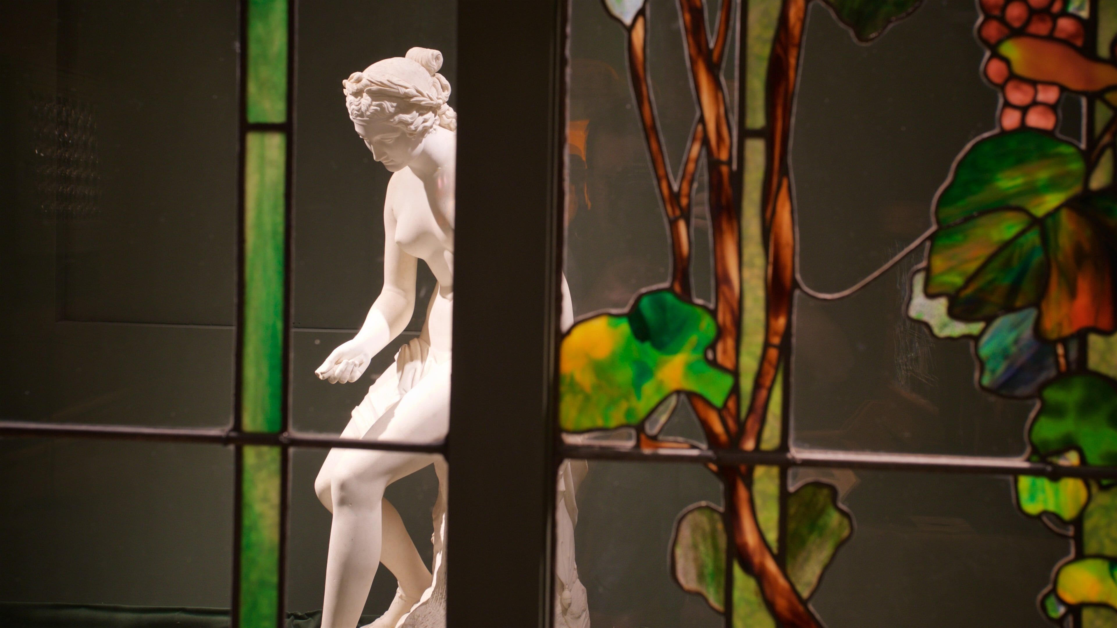 Morse Museum of American Art showing a statue or sculpture and interior views