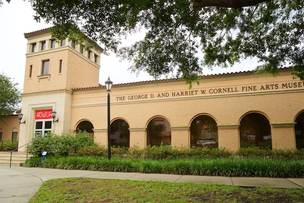 The George D. and Harriet W. Cornell Fine Arts Museum with arched windows and a tower.