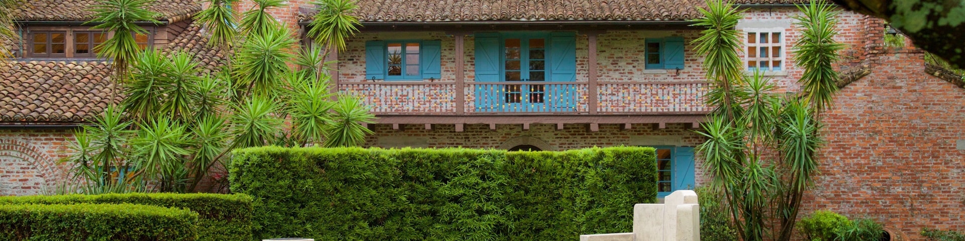 Casa Feliz Historic Home Museum which includes a garden and a house