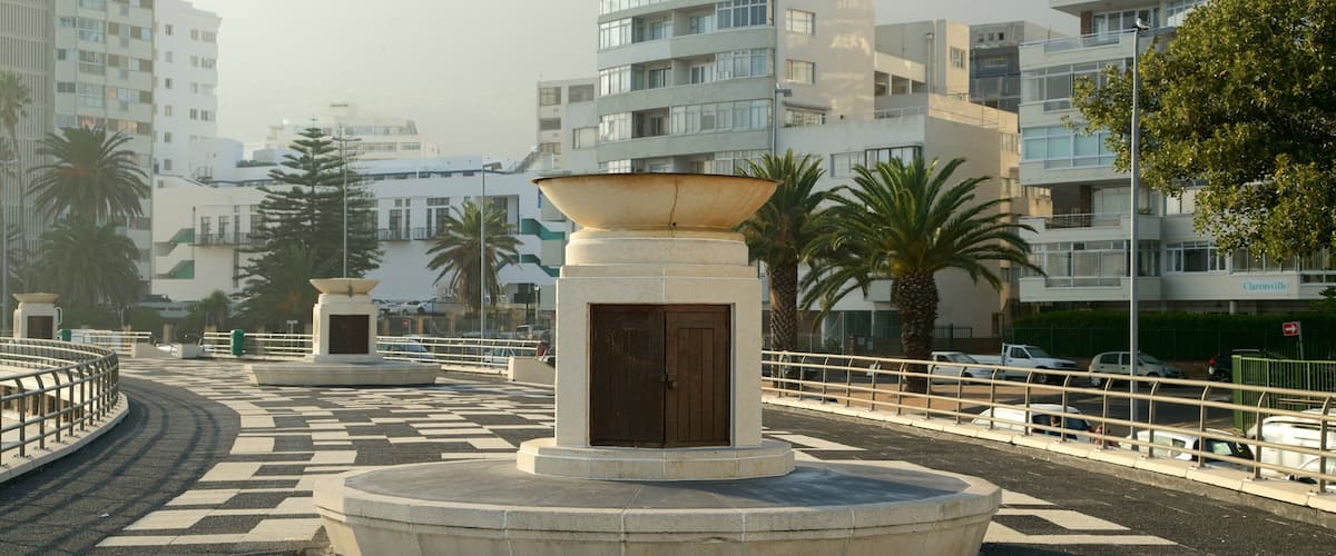 Sea Point Pavillion which includes a city, outdoor art and a bridge
