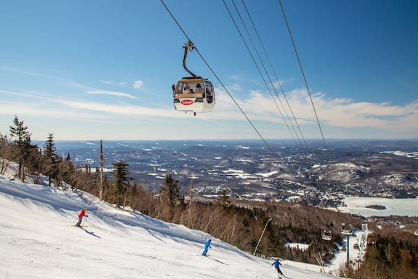 Express Gondola featuring snow, landscape views and a gondola