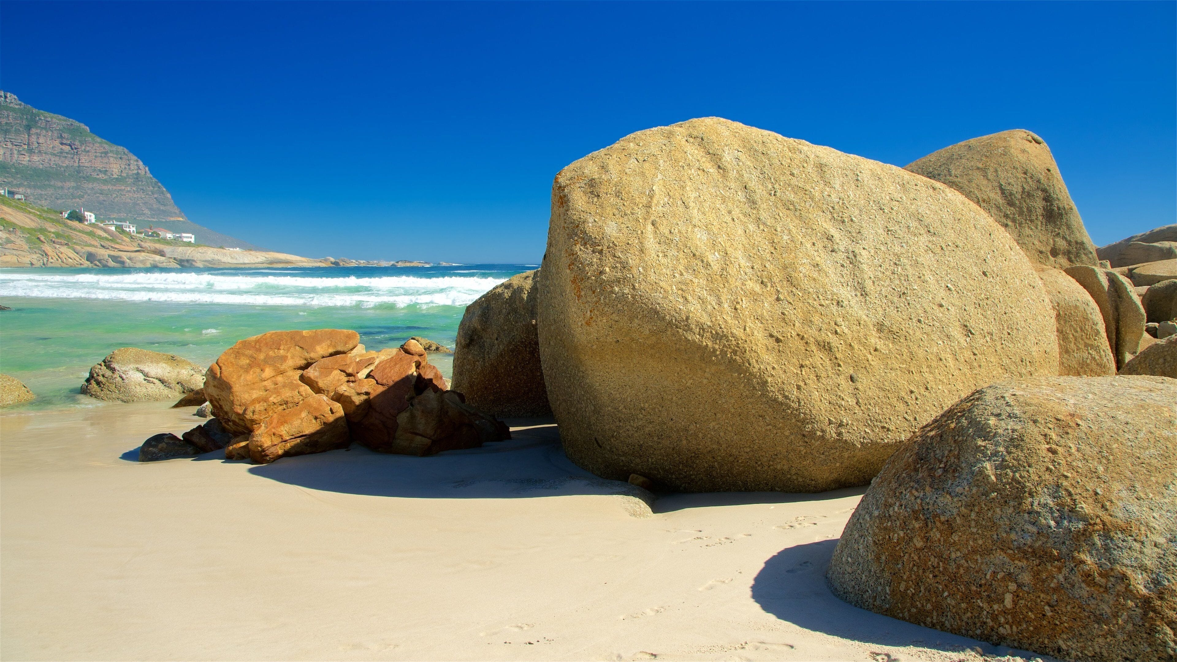 Llandudno which includes a sandy beach and general coastal views