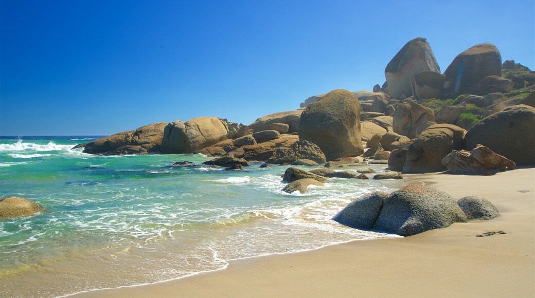 Llandudno showing a beach, rocky coastline and general coastal views