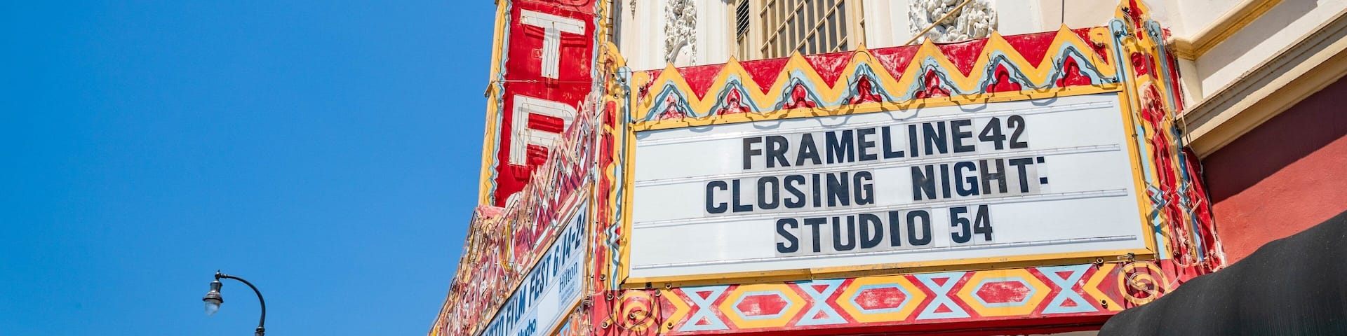 Castro Theatre which includes signage