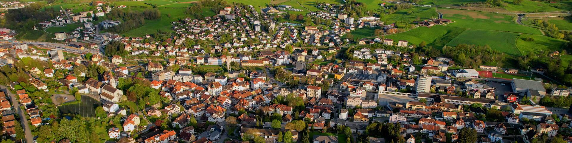 Panoramic aerial of the old town of the city Moutier in Switzerland on a sunny noon in summer
