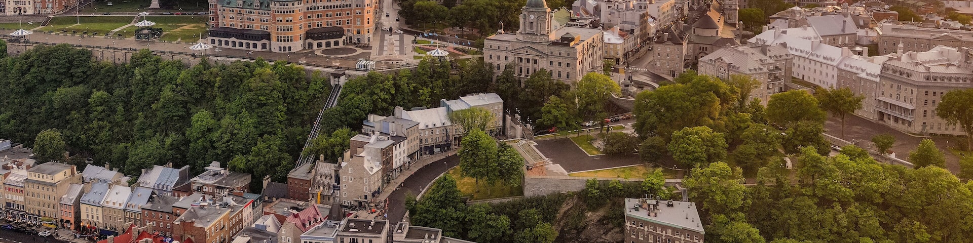 La Cite-Limoilou which includes a city, a sunset and landscape views