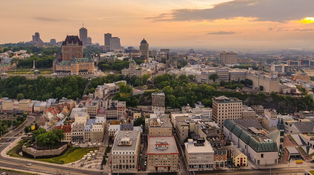 La Cite-Limoilou which includes landscape views, a sunset and a city