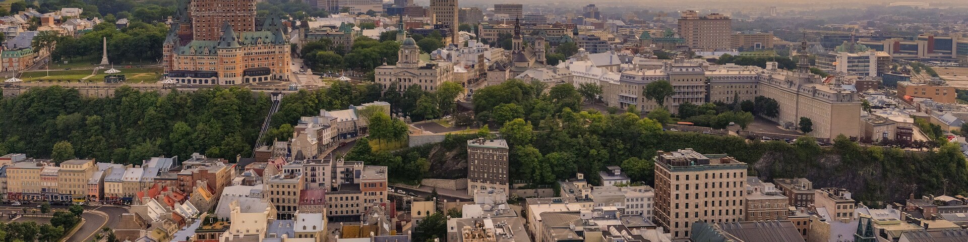 La Cite-Limoilou which includes landscape views, a sunset and a city