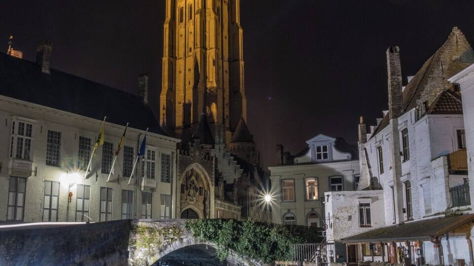 A lovely scene, with the well lit Church and the peaceful water of the canal.