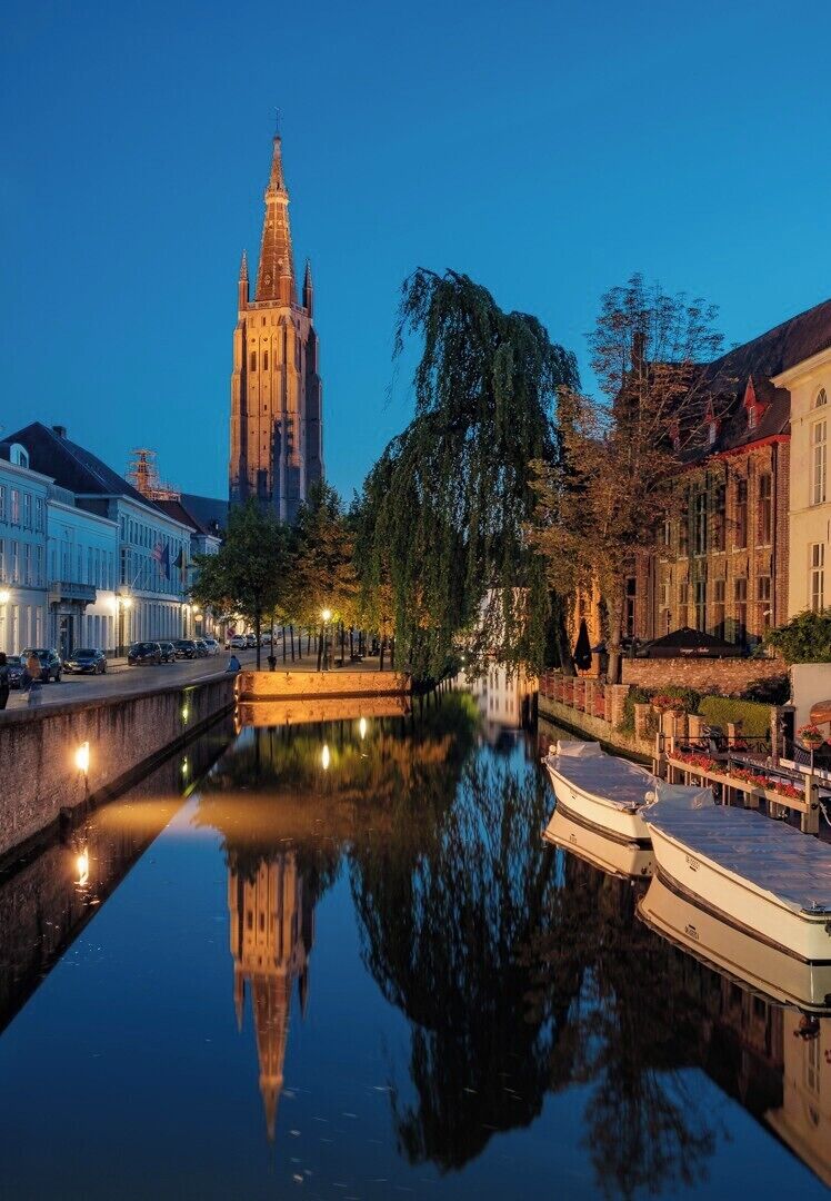 Bruge's canals are a great place to photograph reflections.
Here is the Church of Our Lady Bruges