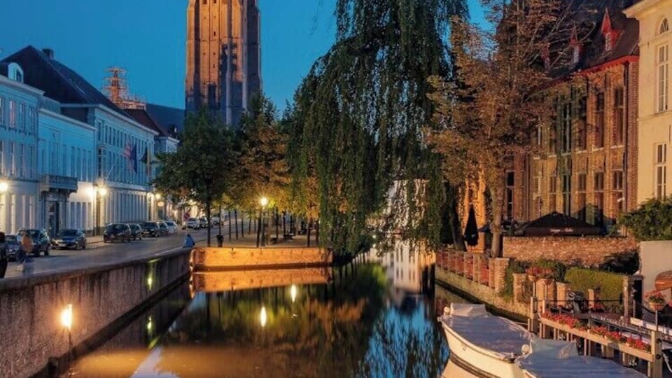 Bruge's canals are a great place to photograph reflections.
Here is the Church of Our Lady Bruges