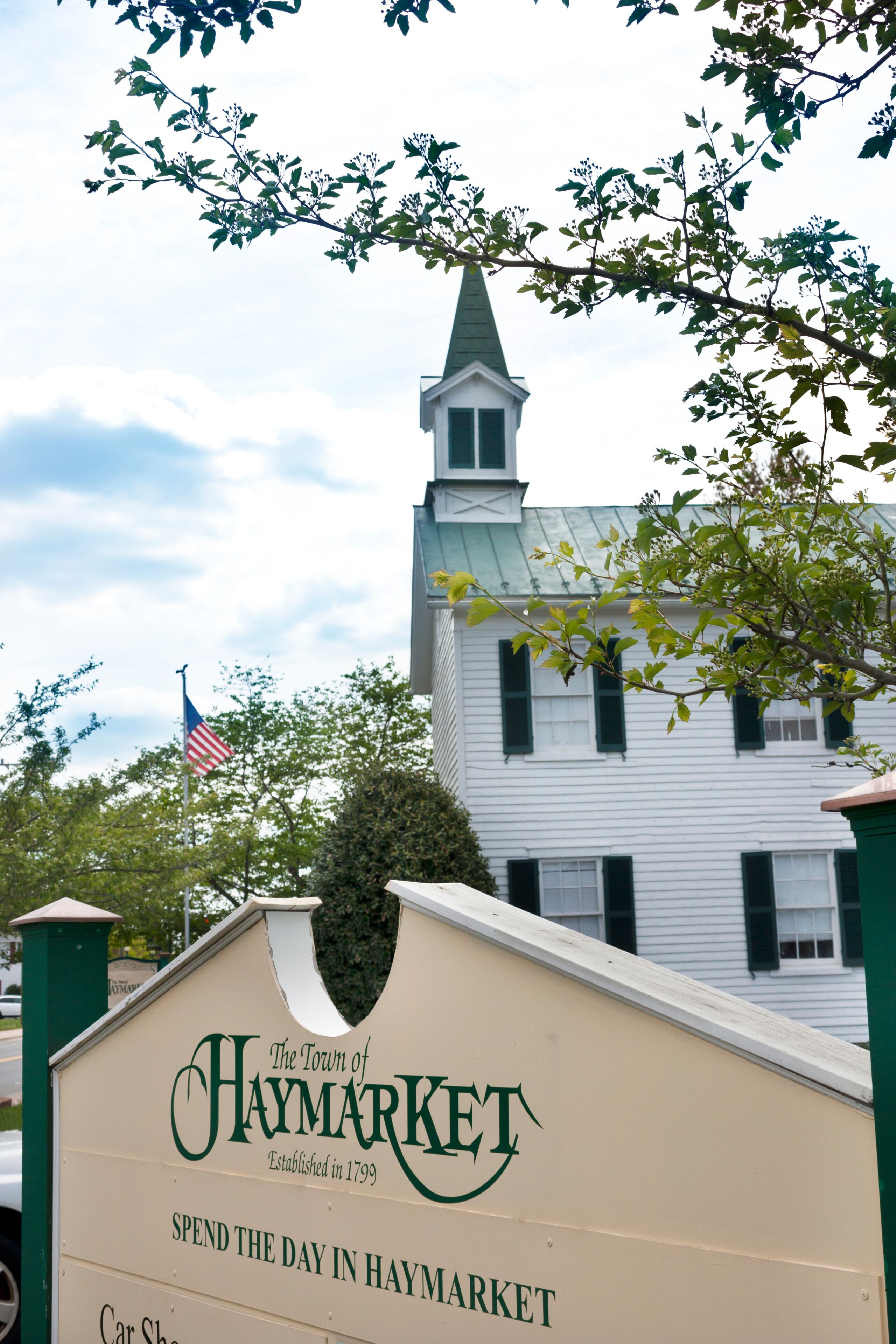 Sign in Haymarket Virginia with church in background