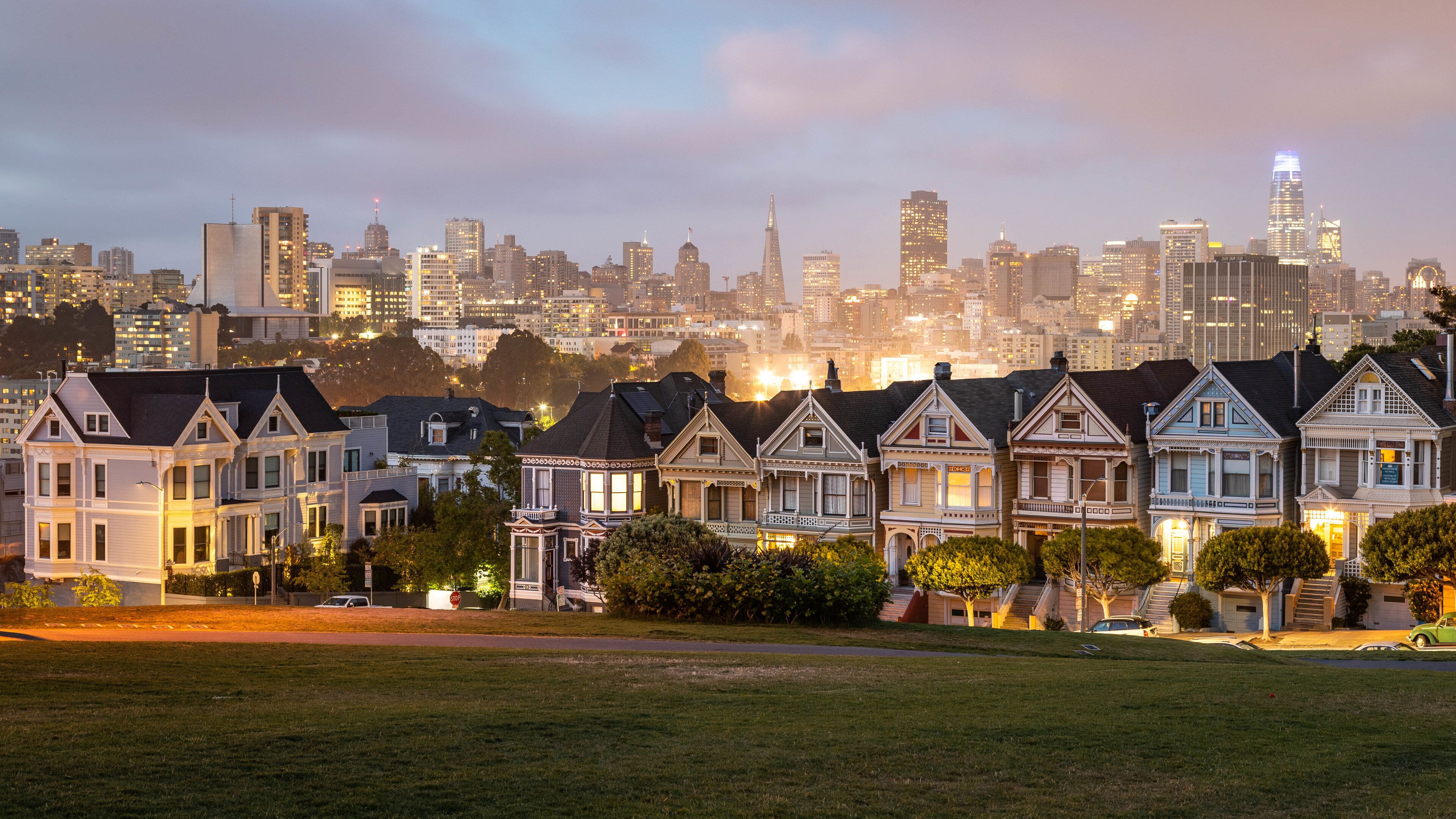 Painted Ladies which includes a sunset, a city and night scenes