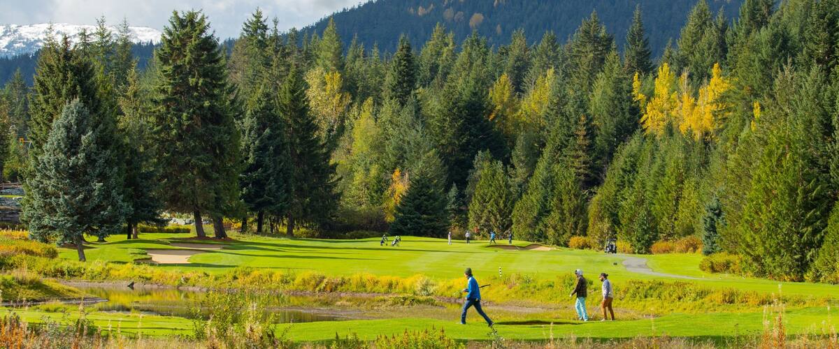 Whistler Golf Club featuring golf as well as a small group of people