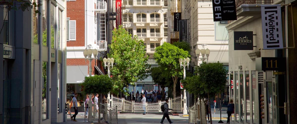 Maiden Lane which includes signage, a city and central business district