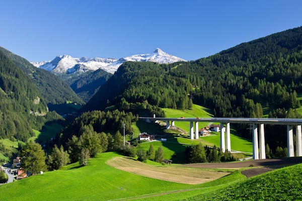 Alpine landscape with motorway pass between Austria and Italy