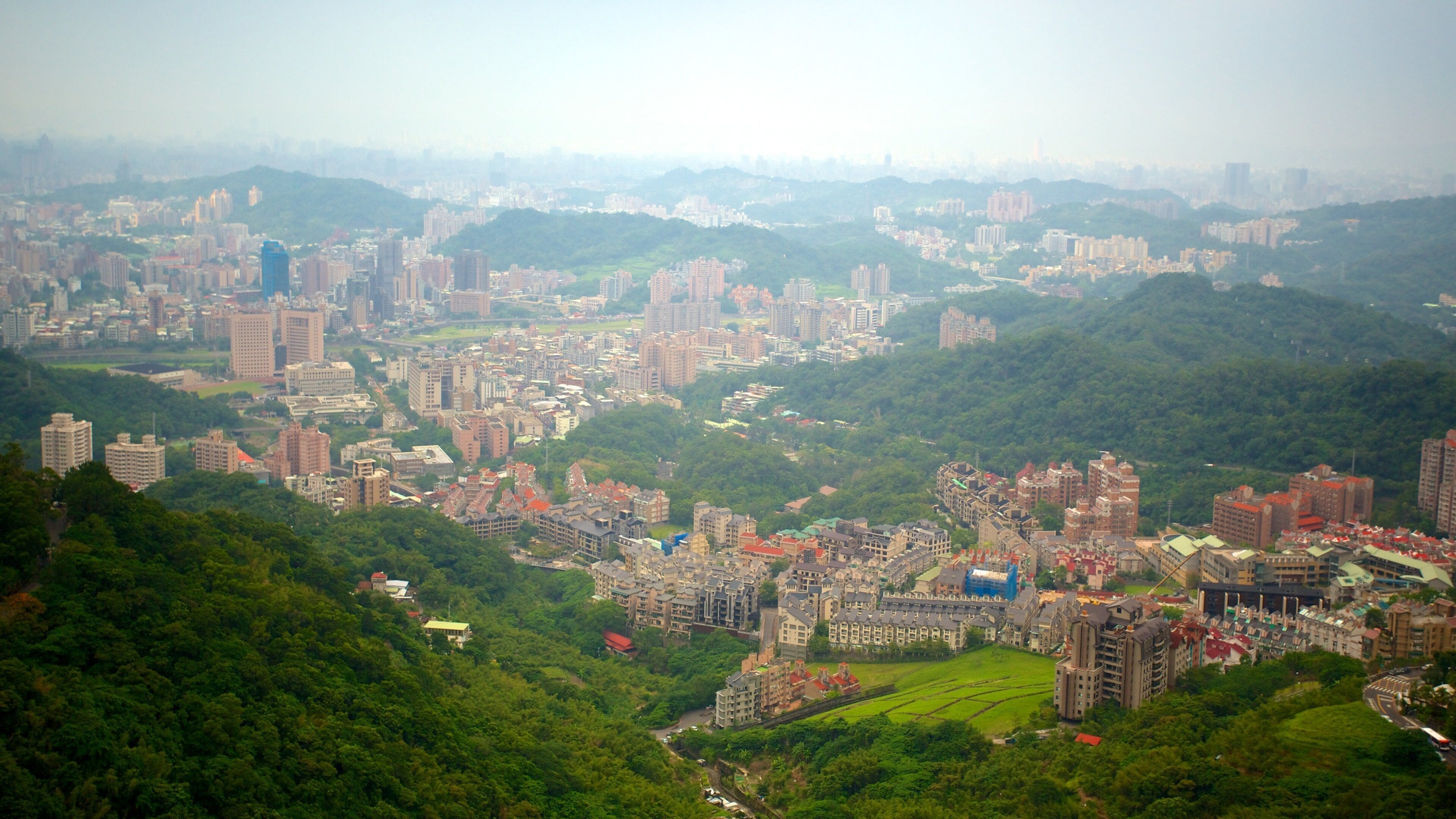 Maokong Gondola featuring a city