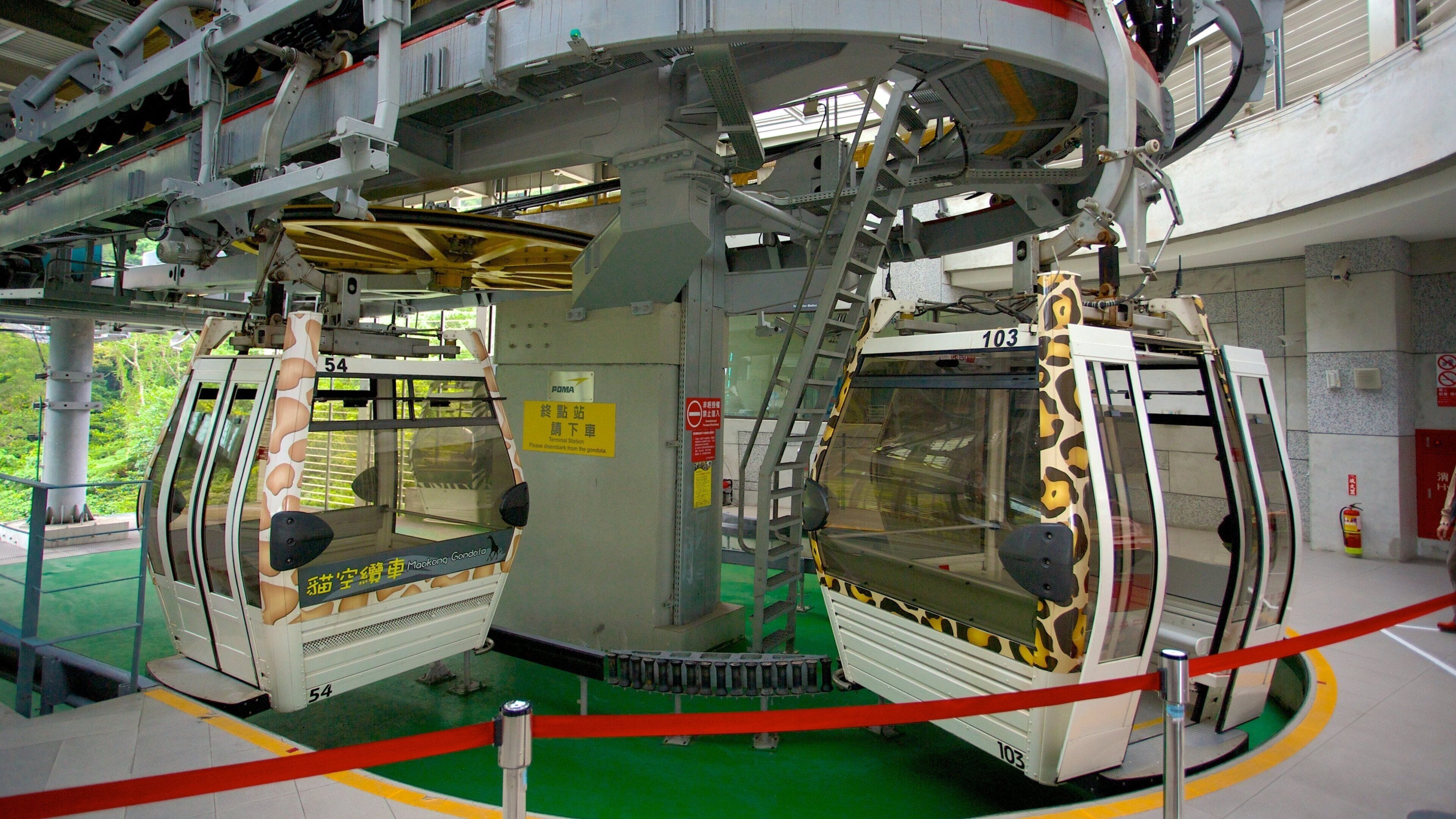 Maokong Gondola featuring a city, a gondola and interior views